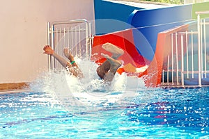 A young man is rolling on a watery crust.