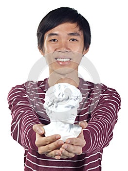 Young man with Roman bust in his hands