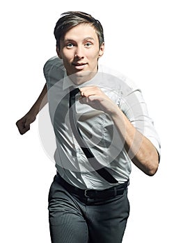 Young man running over white background