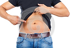 Young man`s fatty abdomen