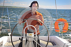 Young Man is Sailboat Captain