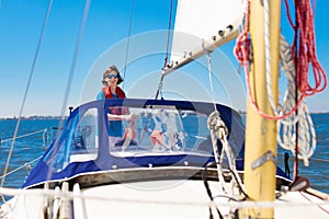 Young man sailing. Teenager boy on sea sail boat