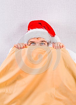 Young Man in Santa Hat