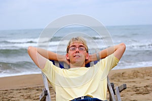 Young man on sea beach