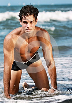 Young man in the seashore