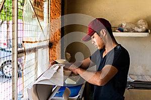 Young man selling tortillas of nixtamal photo