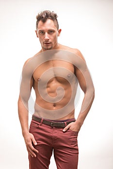 Young man shirtless pants body muscular model