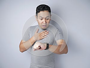 Young Man Shocked to See Wrist Watch, Late Concept