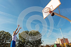 Young man shooting free throws from the foul line