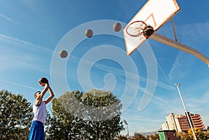 Young man shooting free throws from the foul line