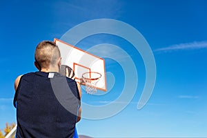 Young man shooting free throws from the foul line