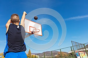 Young man shooting free throws from the foul line