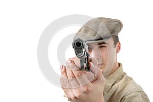 young man shooting with a gun, vintage clothes, isolated on a white background