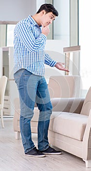 Young man shopping in furniture store