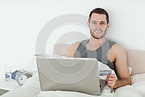 Young man shopping online