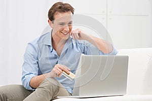 Young Man Shopping Online