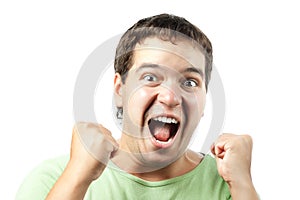 Young man shouting from victory isolated on white