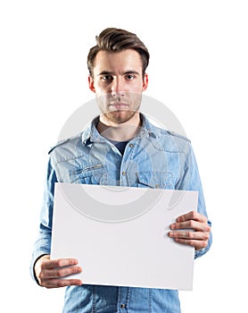 Young man showing a blank paper page