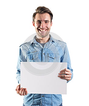 Young man showing a blank paper page