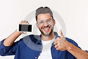 Young man showing his brand new smart phone isolated on white.