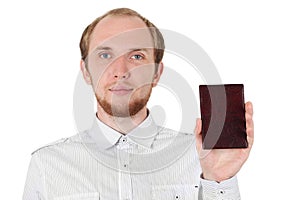 Young man in showing his id document isolated photo
