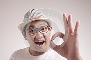 Young Man Showing Okay Gesture