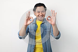 Young Man Showing Okay Gesture