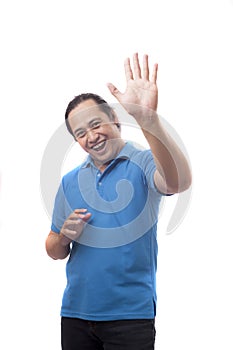 Young Man Shows Palm, Waving and Smiling
