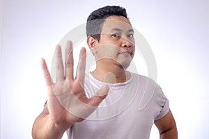 Young Man Shows Stop Gesture