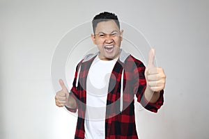 Young Man Shows Thumbs Up