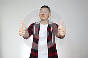 Young Man Shows Thumbs Up
