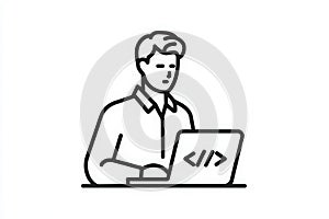 Young man coding on a laptop while focused in a modern workspace