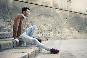 Young man sitting