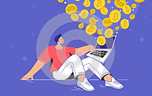 Young man sitting alone and buying or selling bitcoins on laptop