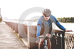 Young man sitting on a bicycle