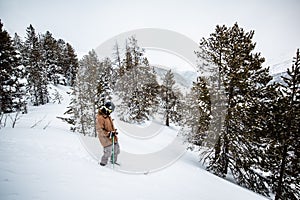 Young man skiing down a mountain