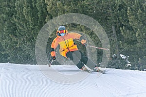 Young man skiing in the Pyrenees at the Grandvalira ski resort in Andorra in Covid19 time