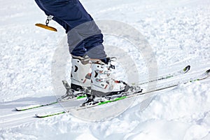 Young man on skis out of slopes, Equipment and extreme winter sports