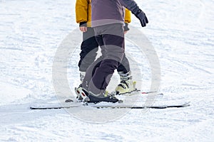 Young man on skis out of slopes, Equipment and extreme winter sports