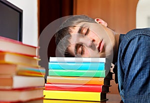 Young Man sleep on the Books