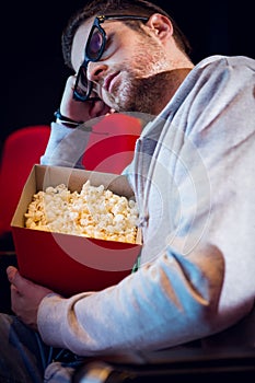 Young man sleeping in chair