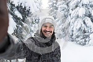 Young Man Smile Camera Taking Selfie Photo In Winter Snow Forest Guy Outdoors