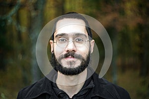 Young Man Smiling at Camera, Enjoying Nature,