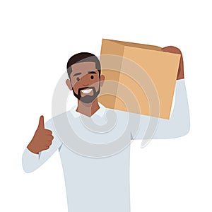 Young man smiling delivery man holding a package box