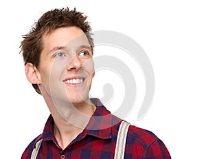 Young man smiling and looking up