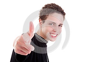 Young man smiling, with thumb up