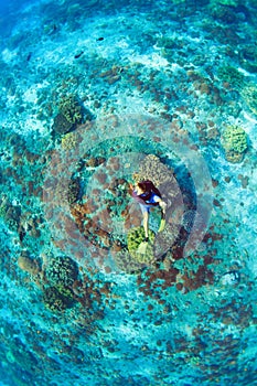 Young man in snorkelling mask dive underwater