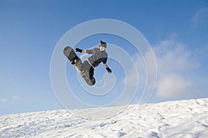 Young man on snowboard