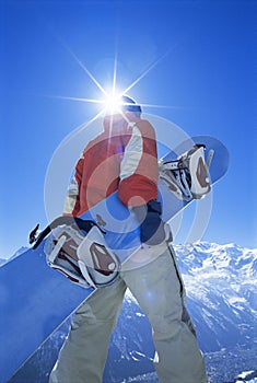 Young man with snowboard