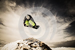 Young man snowboarder